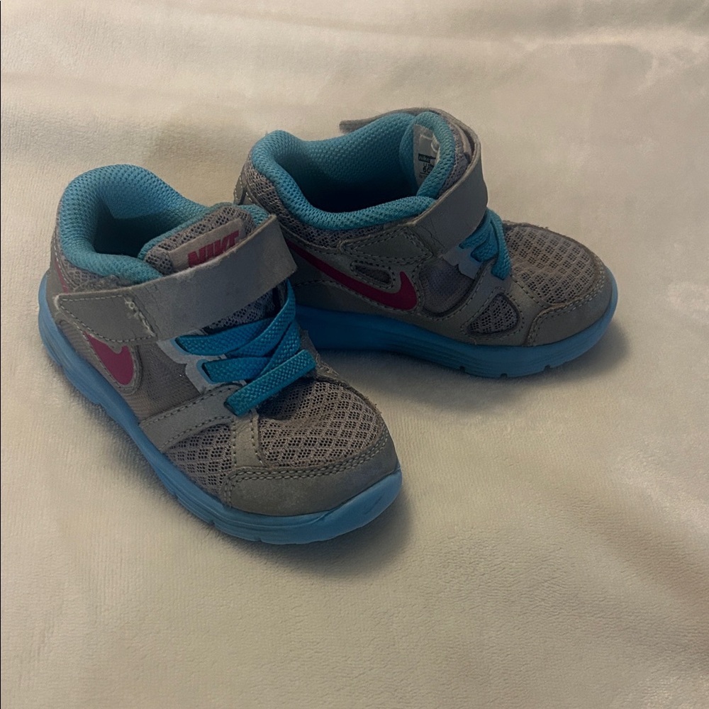 Nike Lunar Forever 2 size 6toddler girl's running shoe in silver, blue, andpink